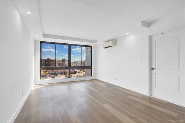 Building Photo - 4516 83rd St Unit E8K Rental