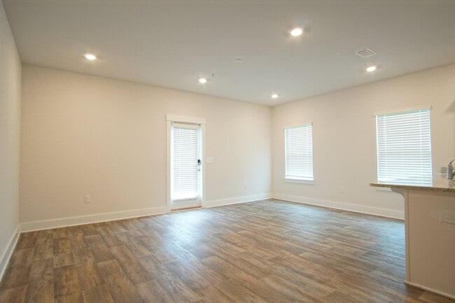Photo - Spacious 3BR/2.5BA Townhome with 1-Car Garage in Admiral’s Quarters—Pool, Dog Park, Near 9 Mile R...