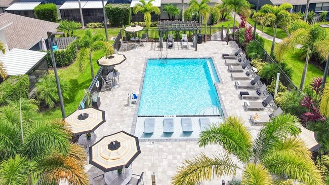 Dive into bliss at our resort-style pool, where relaxation meets luxury. - Slate Luxury Apartments