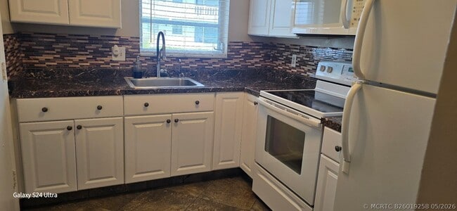 Building Photo - 1621 NW 46th Ave Unit 101
