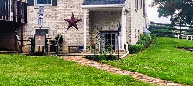 Entrance to lower level apartment - 13505 Kretsinger Rd Unit Lower Level