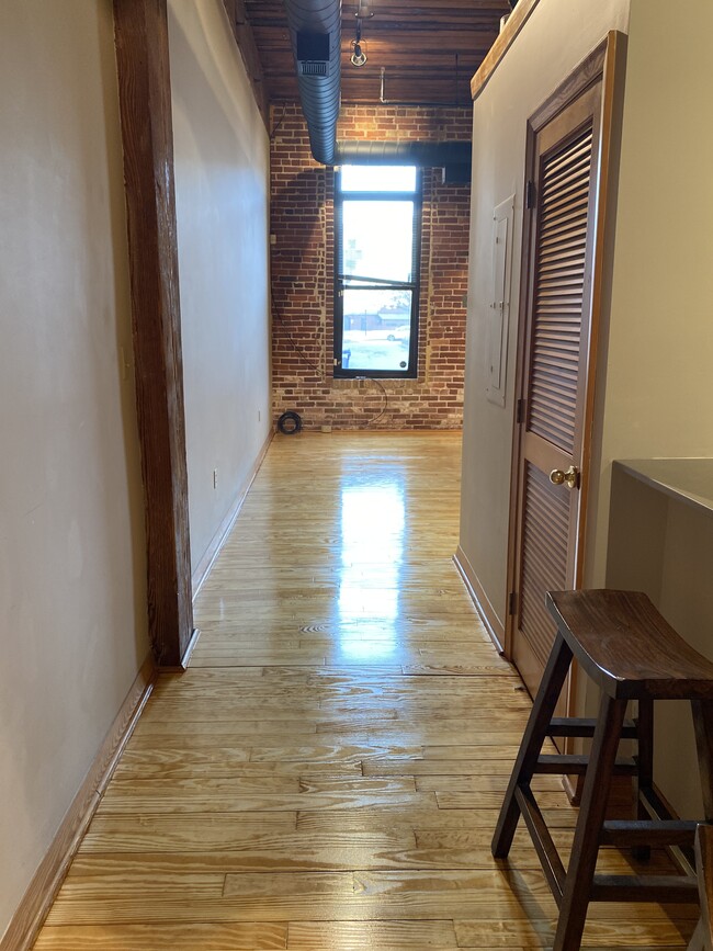 Refinished satin floors - 230 W Tazewell St Unit 105