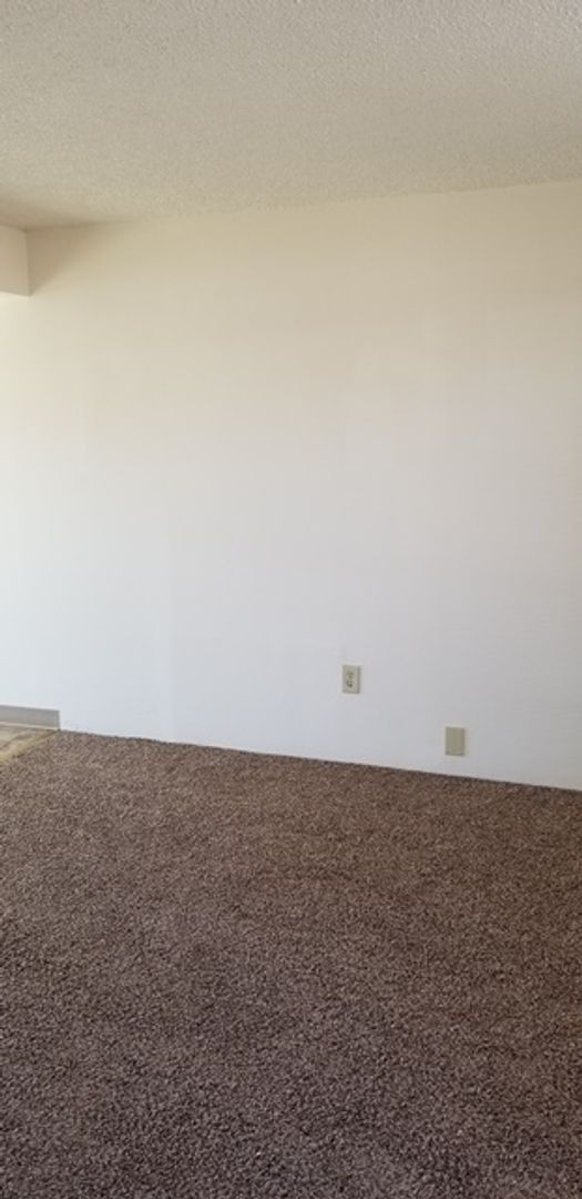 Photo - End unit in 8-plex complex