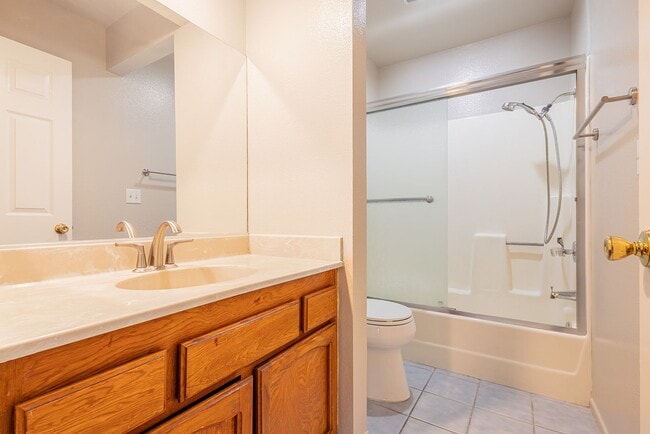 Photo - Spacious Single-Story 3-Bedroom Condo with Private Patio and 2-Car Garage Unit 4