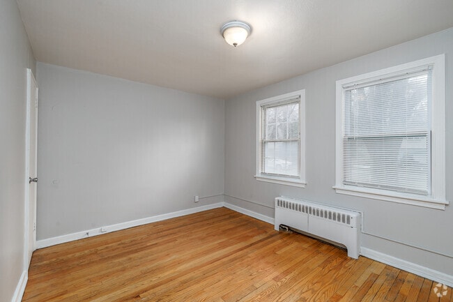 Nova - 2BR, 1BA - 590SF - Primary Bedroom - Sunnycrest Manor