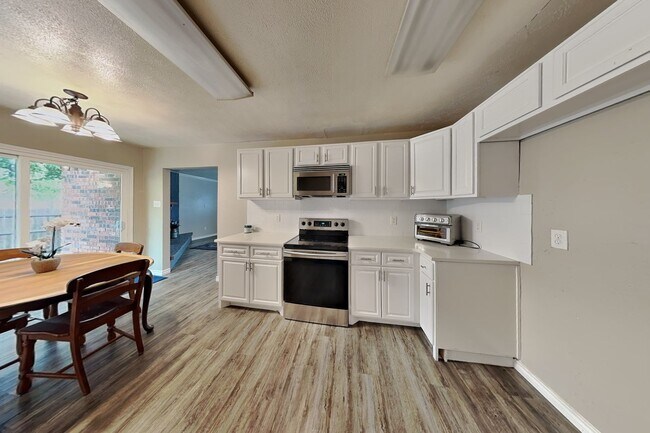 Photo - Don't miss your opportunity to make this Camelot gem your next home—schedule your tour today!