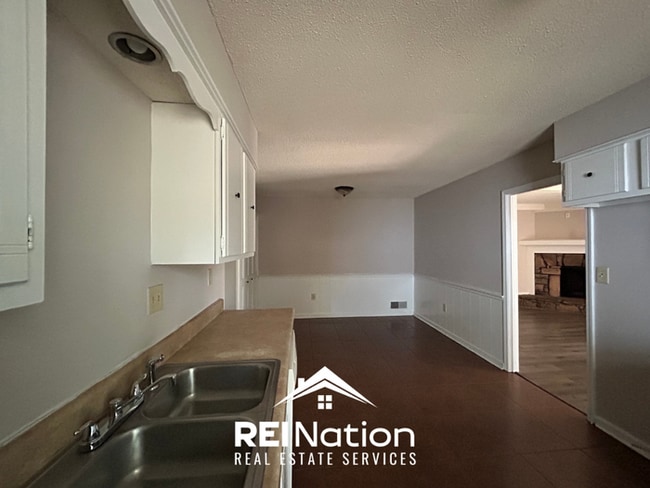 3BR/2BA Memphis Rental with Attached 2-Car Garage & Hardwood Flooring