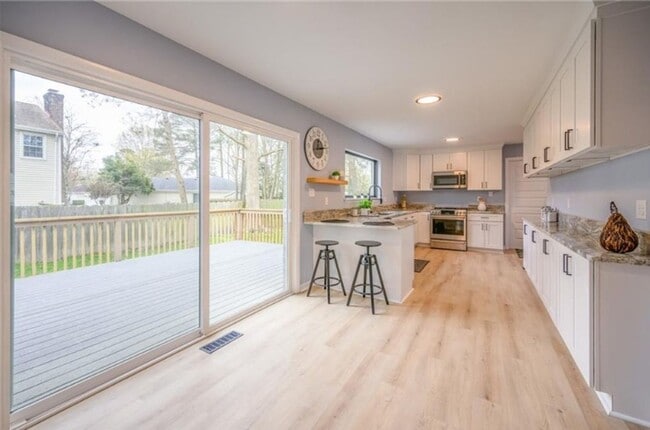 Photo - Fully renovated 4BR, 2.5BA home in the highly desired Great Neck Meadows!