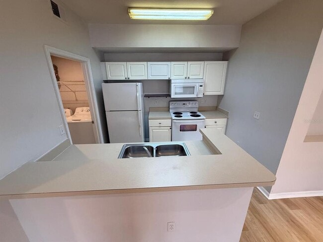 Photo - 5506 Metrowest Blvd Unit 211