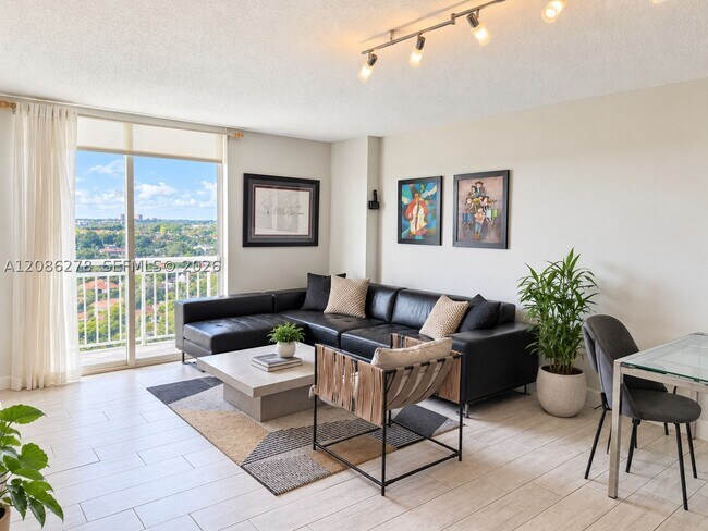 Building Photo - 3000 Coral Wy Unit 1408