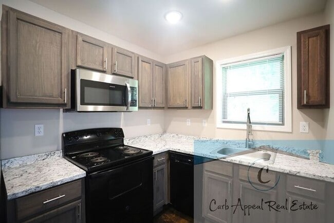 Photo - Beautiful 4 bed 2 bath home - HUD accepted!!