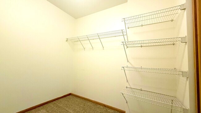 2-Bedroom apartment featuring walk-in closets in the primary bedroom.