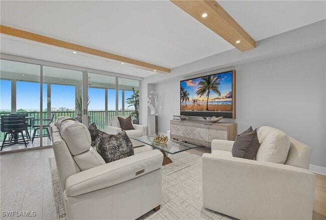 Building Photo - 7515 Pelican Bay Blvd Unit 5B