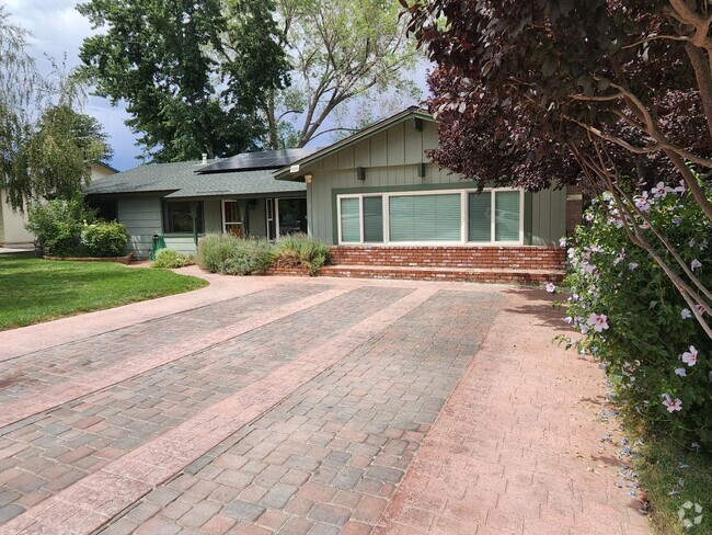 Building Photo - Spacious three bedroom home with solar