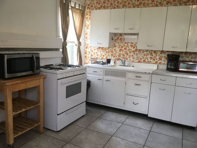 Building Photo - 5626 Wilkins Ave Unit 3