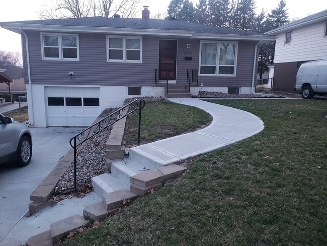 Front view of the home! New driveway, walkway, siding, roofing, and windows - 2616 S 48th Ave House