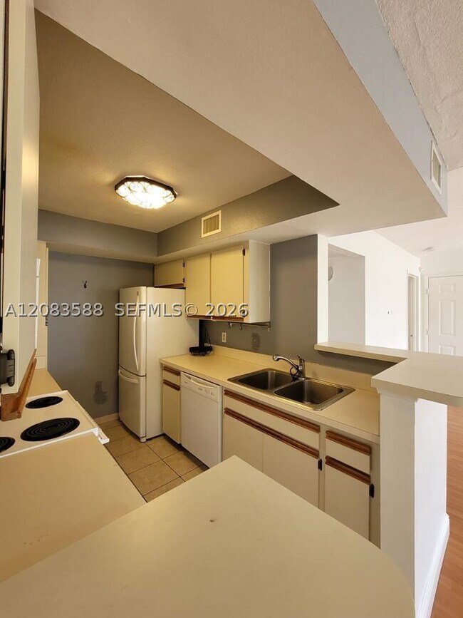 Photo - 10581 SW 155th Ct Unit 1228