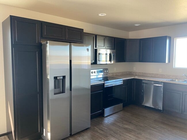 Photo - 4 BED | 2 BATH | DOUBLE GARAGE | RAPID VALLEY