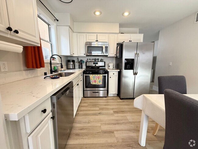 Building Photo - 3/BD 2/BA Stylish Townhouse with Modern Up...