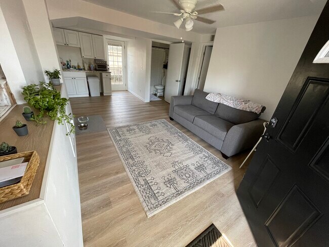 Living room, kitchen and bathroom - 5159 6th Ave N