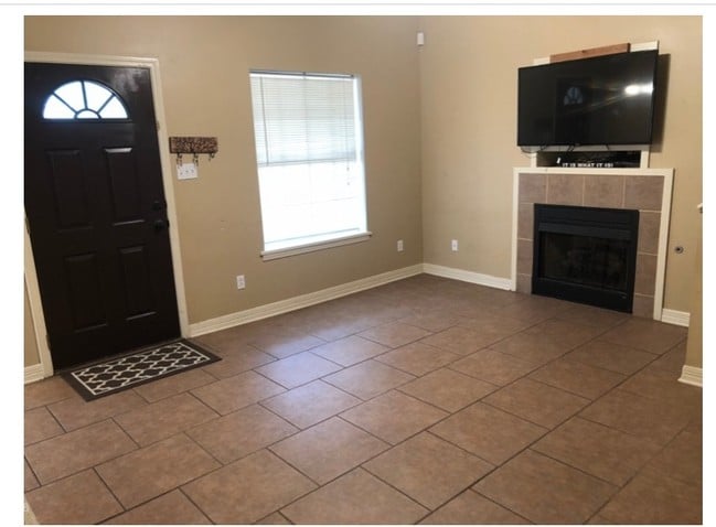 Living room...TV stays for renter. - 2887 W Barnett Springs Ave