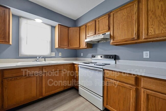 Building Photo - 5809-5811 Pepperwood Court Unit 5809