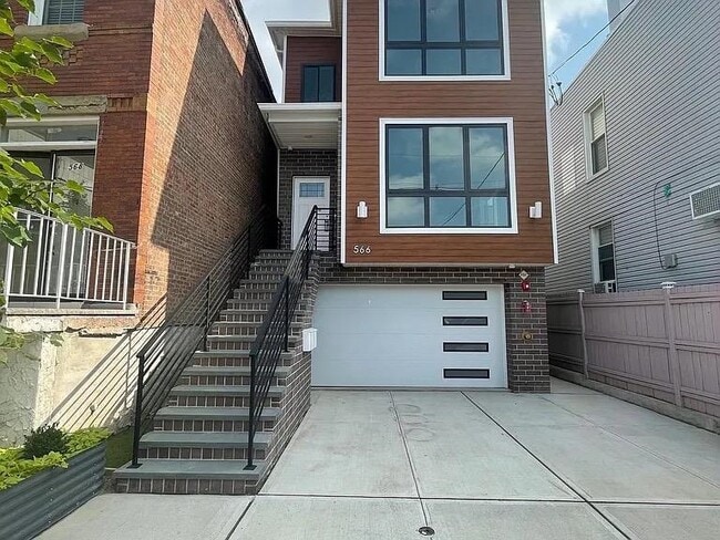 Building Photo - 566 57th St Unit 2