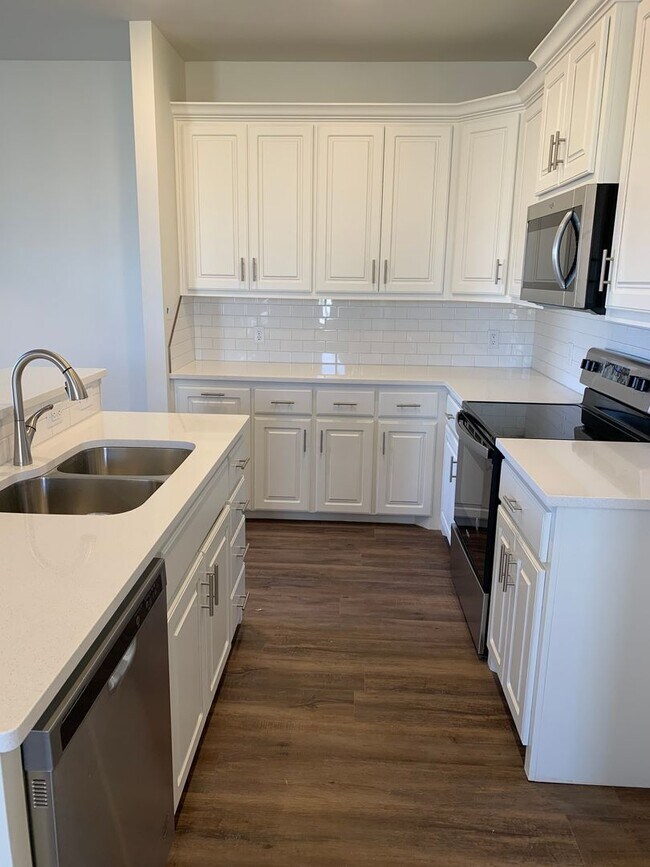 Photo - Beautiful brand new!! All the bells and whistles . Unit B(2)