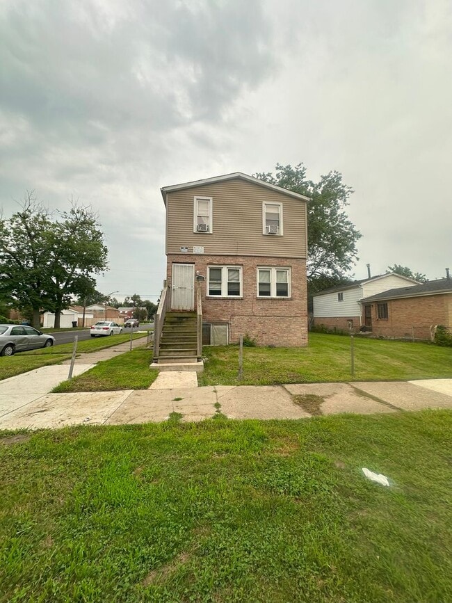 Building Photo - 1201 W 110th Pl Unit -1 Rental