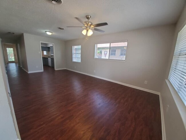 Vinyl flooring throughout the home; great natural lighting. - 6450 Lontos