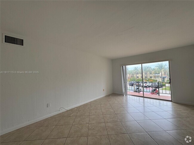 Building Photo - 14034 SW 90th Ave Unit 207-AA Rental
