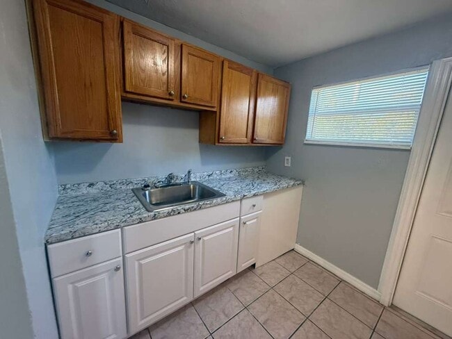 Photo - Cozy 3/1 House | Apply for FREE This Holiday Season!