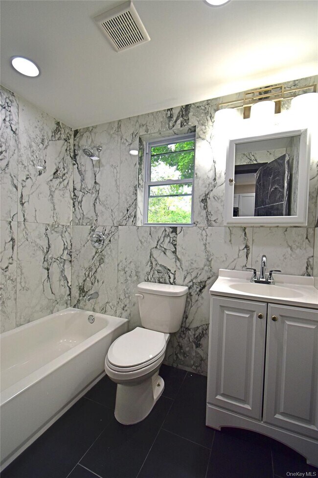 Photo - 108-46 153rd St Unit 1FL