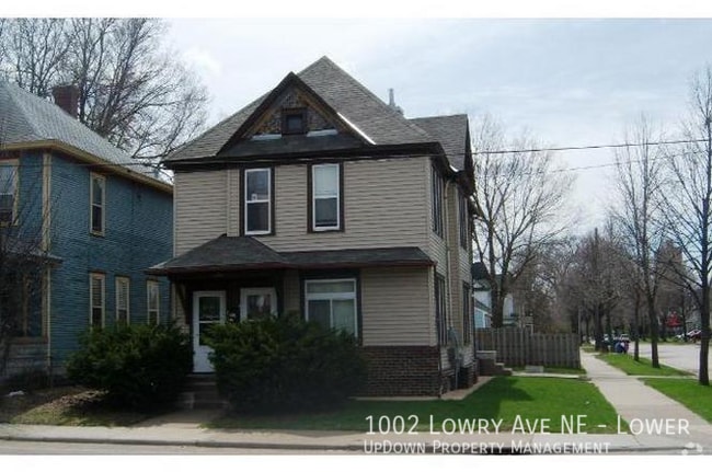 Building Photo - 1002 NE Lowry Ave Unit Lower Rental