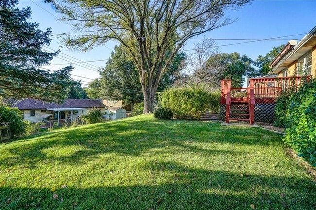 Photo - Coming Soon - Charming 3-Bedroom Home with Fenced Yard & Spacious Deck in Kansas City