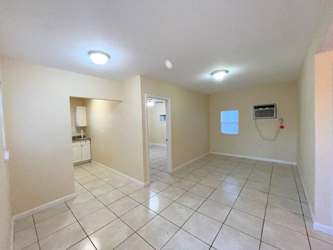 Entry Door | Kitchen | Family | Master BR - 774 NW 41st St