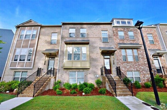 Building Photo - Elegant 4 bedroom townhome conveniently lo...