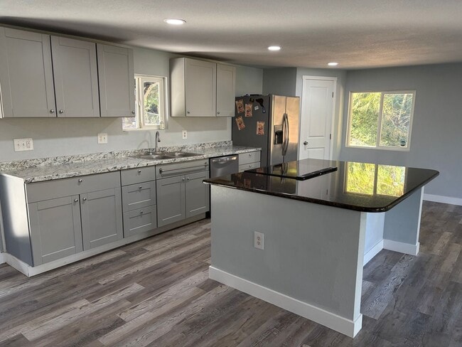 Building Photo - Spacious 3-Bed + Flex Room on Private Fenced 2 Acres, Huge Shop