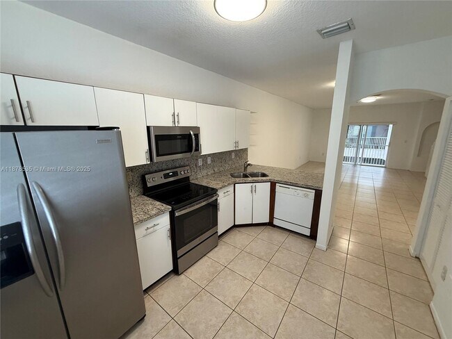 Photo - 5620 NW 114th Path Unit 201