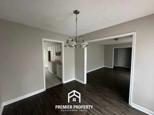 Photo - Charming 3BR Memphis Home | Rustic Brick Fireplace, Formal Dining & Fenced Backyard