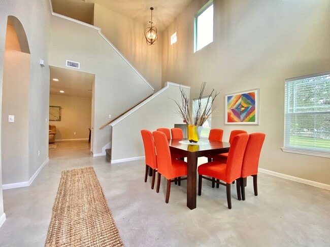 Photo - This charming two-story home, built in 2018, offers a spacious open floor plan perfect for casual...