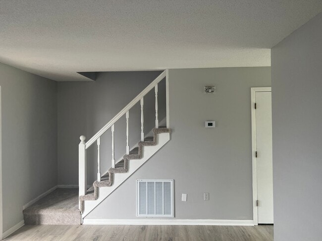 Photo - UPDATED 2 BEDROOM TOWNHOUSE WITH COMMUNITY POOL