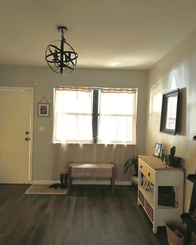 Other side of living room - 511 Ives Dairy Rd Condo Unit F104