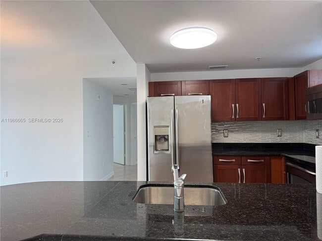 Building Photo - 7285 SW 90th St Unit D614