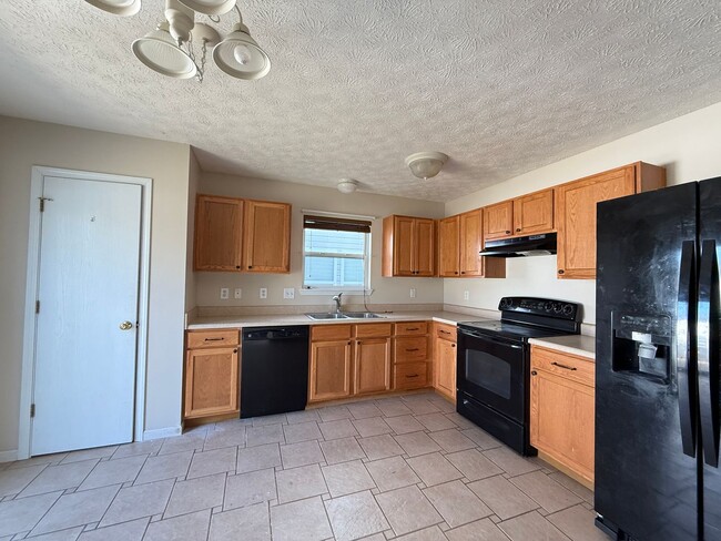 Photo - Charming 3BR/2BA Home in Brittany Chase with Fenced Yard & Fireplace