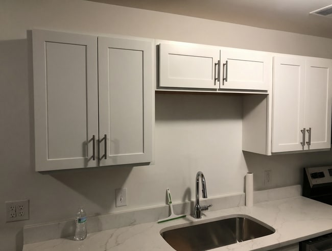 New white shaker cabinets and countertops. - 261 Simpson Ave Unit 226
