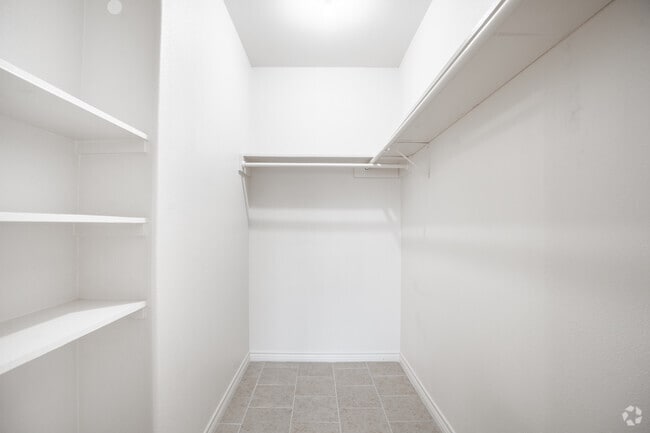 1BR, 1BA - 766SF - Closet - The Red Rose Of Texas Apartments