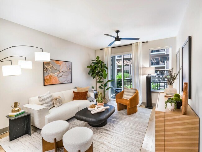 Large windows and open layouts bring warmth and flow to your living space, with thoughtfully selected finishes that complement your style. - Modera Riverview