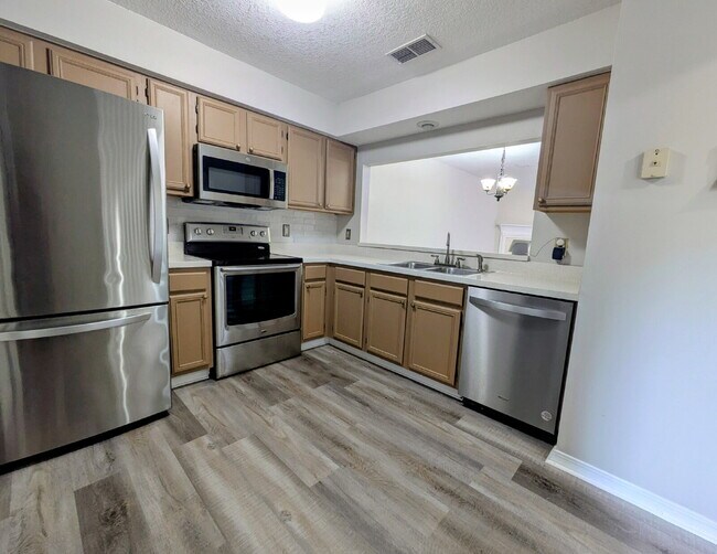 Photo - "$300 OFF MOVE-IN SPECIAL! Spacious 3-Bed, 2.5 Bath Townhouse Nestled in the Heart of East Arling...