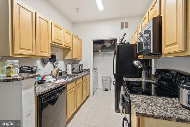 Building Photo - 1591 Spring Gate Dr. Unit 3103